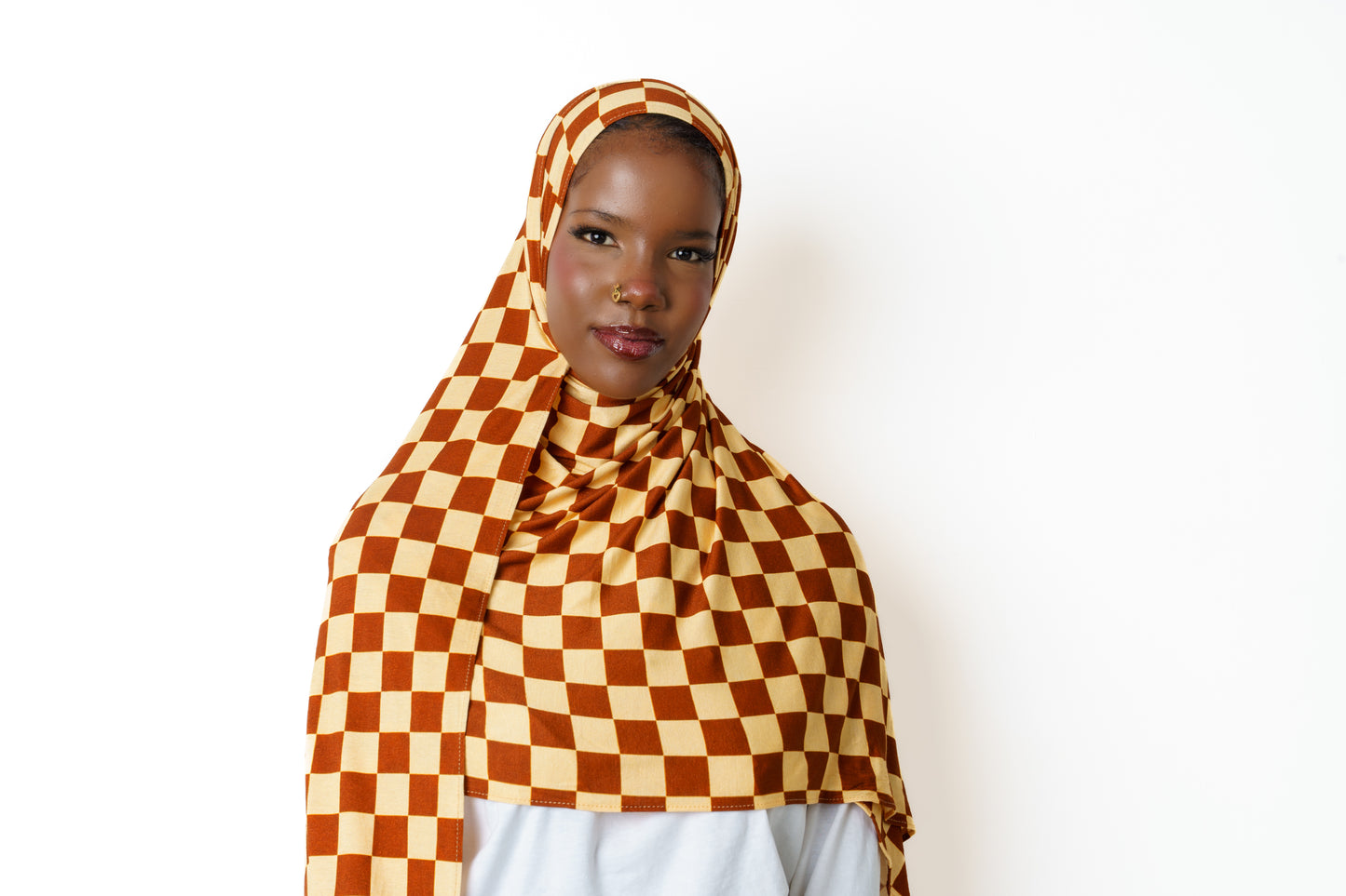 Close-up of Checkmate brown checkerboard jersey hijab