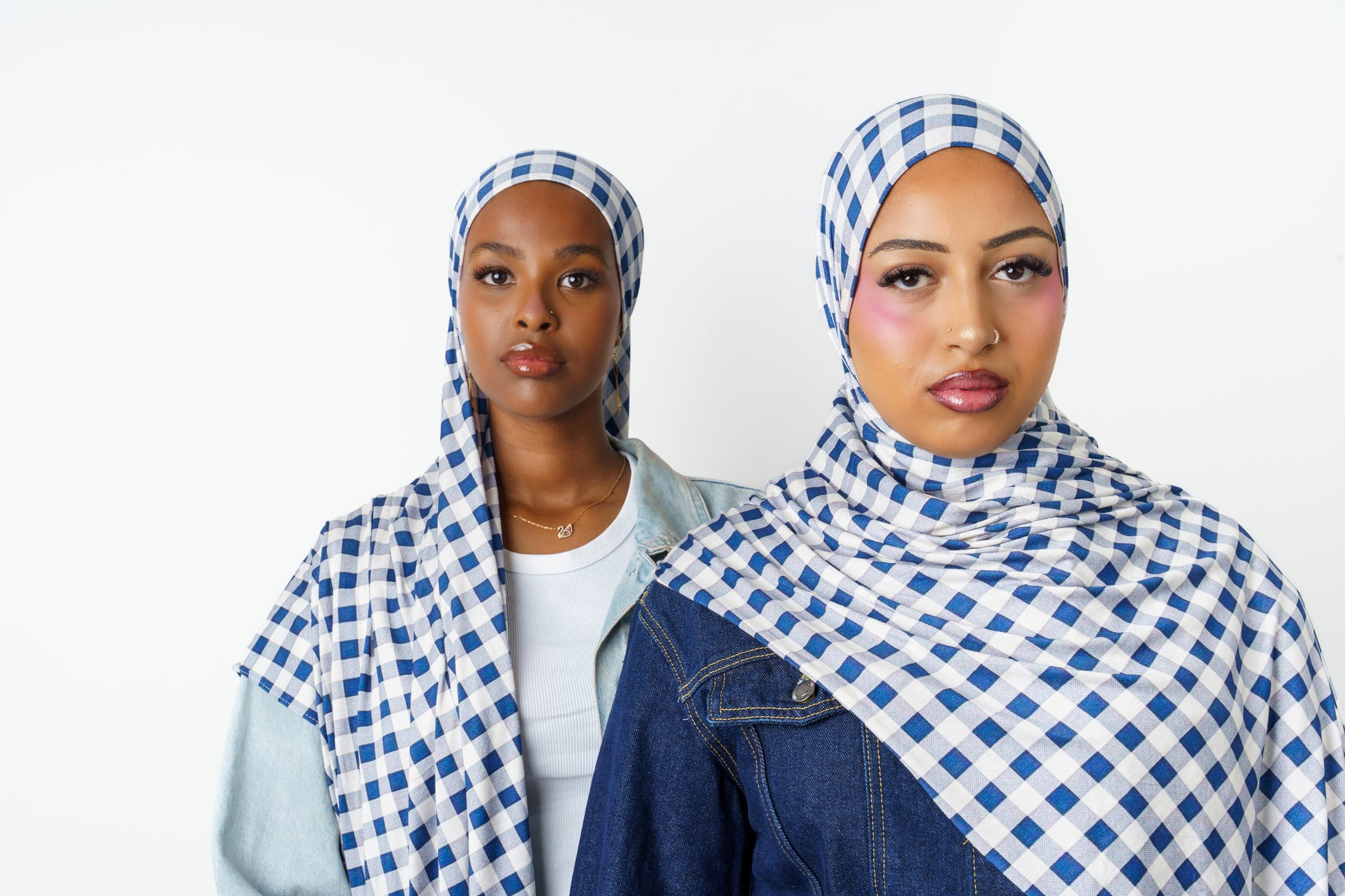 Two women wearing Picnic Club printed jersey hijabs